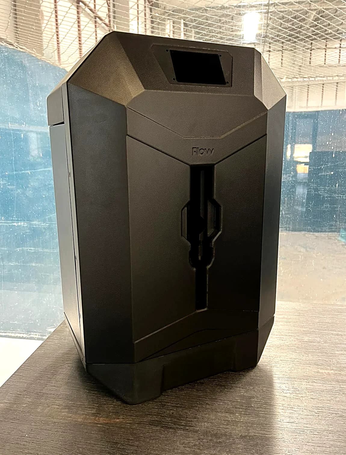 The Flovv desktop resin casting machine in a workshop